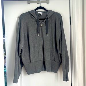 Gray Athleta hoodie. Waist length. Size L